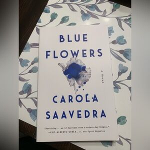 Blue Flowers Novel by Carola Saavedra